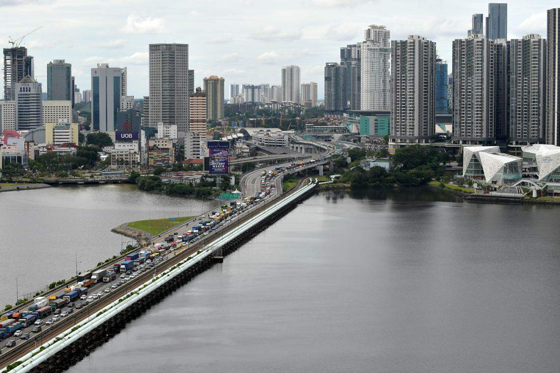 ஜோகூர்-சிங்கப்பூர் எல்லை: இரண்டாவது கியூஆர் குறியீட்டுக் குடிநுழைவு முறையைச் சோதனையிடும் மலேசியா